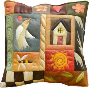 Leather Pillow –  This crazy quilt motif features a peace dove, bee, home, and sun