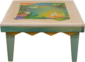 Square Coffee Table –  Whitewash and cool Caribbean colors give this tropical coffee table a funky vibe