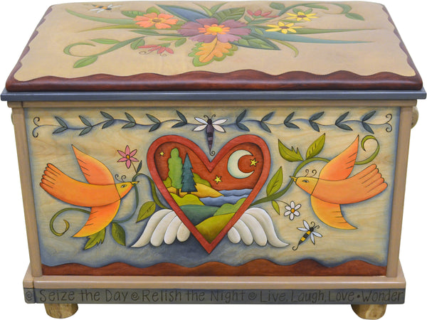 Chest with Leather Top –  Hearts with wings are filled with landscapes and a floral spray motif