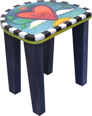 Adorable imagination themed kid's table with cute coordinating heart and star short stools, heart stool alone, side view
