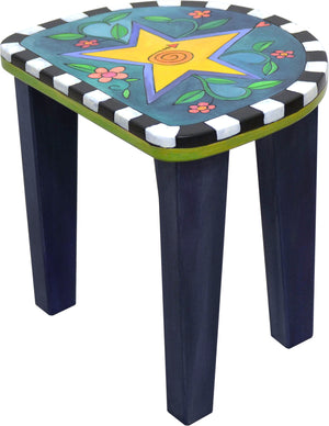 Adorable imagination themed kid's table with cute coordinating heart and star short stools, star stool alone, side view