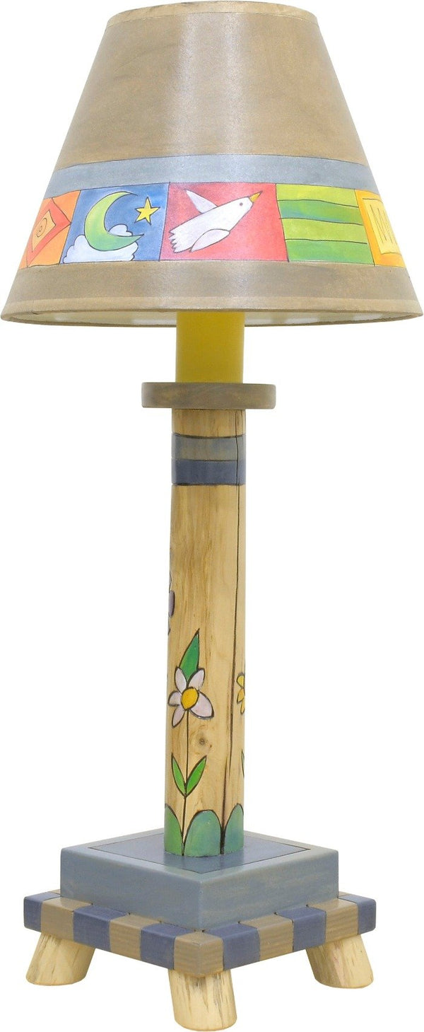 Log Candlestick Lamp –  Warm boxed icon and floral log lamp motif