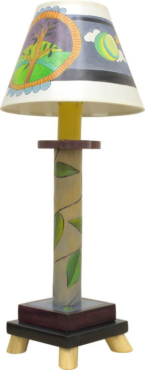 Log Candlestick Lamp –  Lovely lamp with a vine-wrapped base and day and night tree of life shade motif