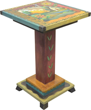 Handsome landscape motif end table with creeping vine on pedestal that also frames the top design