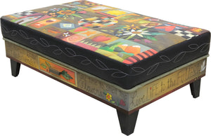 Crazy quilt ottoman motif with center floral sprays and a contrasting stitched vine around its edge