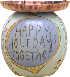 "Happy holidays together" candle holder with a cozy winter home motif
