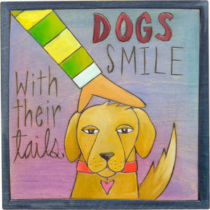 "Dogs Smile with their Tails" plaque with a good pup getting pats on the head