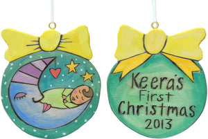 Remember a little one's first Christmas with this ball and bow ornament