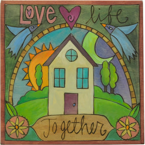 "Love life together" plaque with Sticks home and love birds flying above
