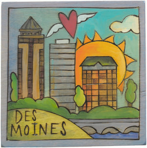 "Des Moines" plaque with the city skyline along the Des Moines river motif