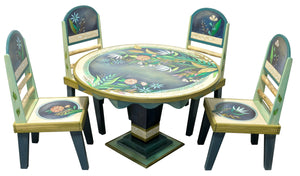 48" Round Dining Table – Gorgeous blue and whitewash floral and botanical table with coordinating chairs table staged with chairs