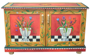 Medium Buffet – Colorful and eclectic buffet with bright reds, floral motifs and interior shelving front view