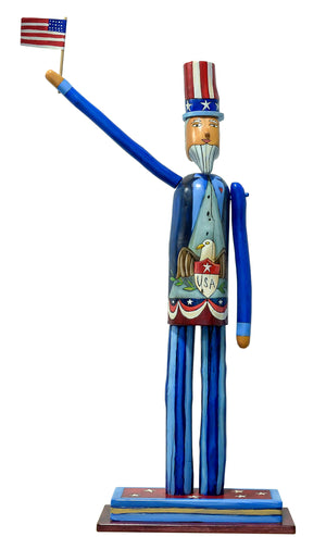 Medium Uncle Sam Sculpture – Sam dressed in a blue suit with a bald eagle emblem on his front and American landscape filled heart on his back front view