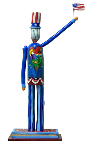 Medium Uncle Sam Sculpture – Sam dressed in a blue suit with a bald eagle emblem on his front and American landscape filled heart on his back back view