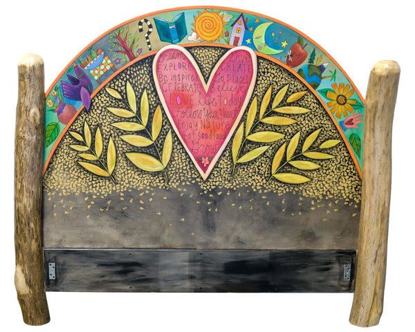 Queen Bed – Beautifully bold bed with a giant heart and floating icons above and coordinating footboard with stacked icons in a landscape motif headboard view