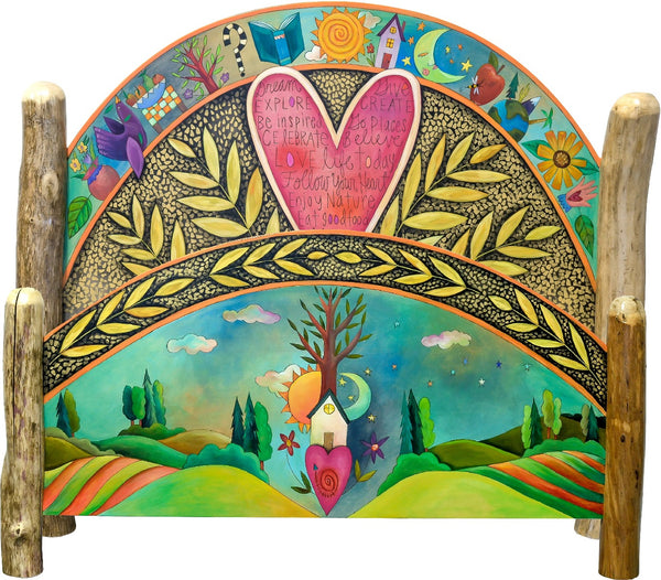 Queen Bed – Beautifully bold bed with a giant heart and floating icons above and coordinating footboard with stacked icons in a landscape motif main view