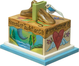 Tzedakah Box – Bright and colorful tzedakah box with landscape scenes on its sides front view