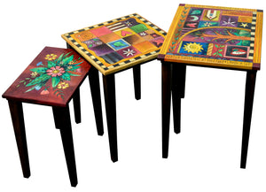 Nesting Table Set – Rich and eclectic nesting table set with crazy quilt, patchwork, and floral spray designs on each descending tabletop side view