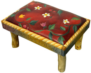 Ottoman – Lovely red "live life to the fullest" ottoman with a floral vine and rope border edge plus natural log legs that tie the whole look together main view
