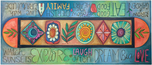 Prototype Sofa Table –  Inspirational words and phrases with decorative icons in the center. Top View.