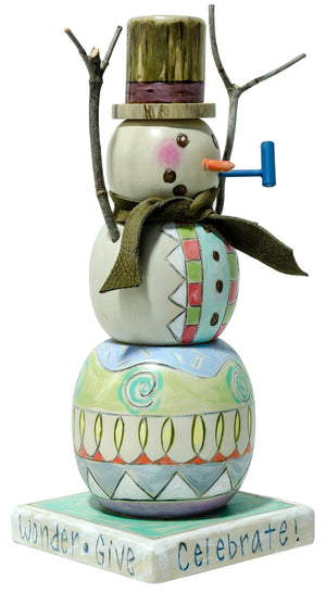 Extra Small Snowman Sculpture –  "Celebrate" snowman with light, pastel colored Christmas patterns. Side