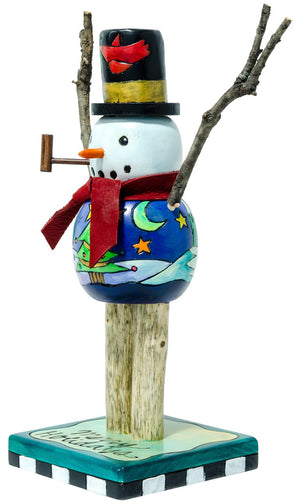 Extra Small Snowman Sculpture –  Driftwood leg snowman with a snowy landscape design and a bird on his top-hat. Side