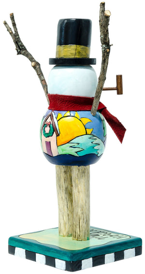 Extra Small Snowman Sculpture –  Driftwood leg snowman with a snowy landscape design and a bird on his top-hat. Back