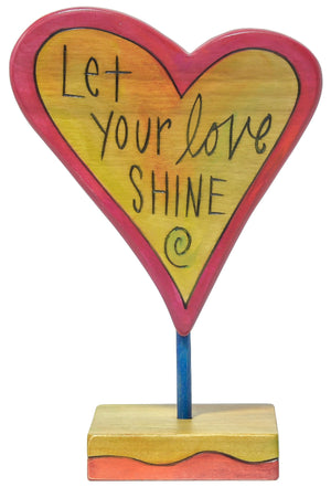 let your love shine on a handmade heart sculpture