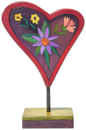 handmade heart sculpture with floral design
