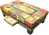 Ottoman with Drawer – Beautiful leather ottoman with stitched boxed icons. Other side with open drawer