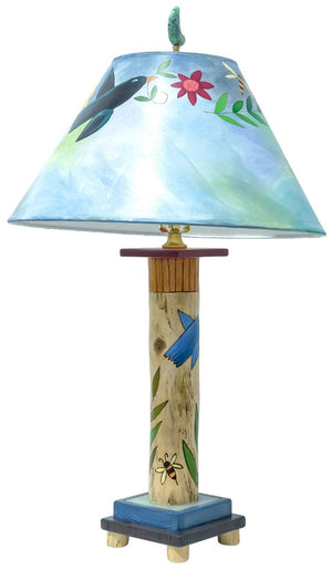 Log Table Lamp – Lamp with flora and vine elegant table lamp with blue shade. Side View