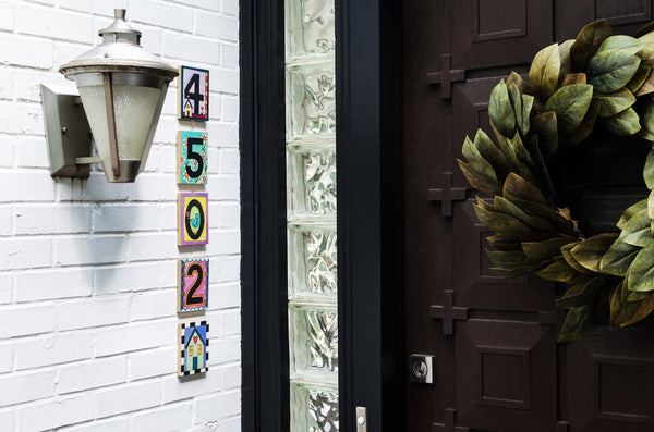 Example of Sincerely, Sticks "2" house number plaque at a front door