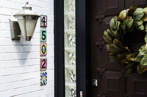 Example of Sincerely, Sticks "5" house number plaque at a front door