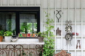 Example of Sincerely, Sticks alphabet letter plaques to say Relax on window sill