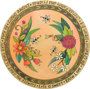 "For the Bees" Lazy Susan – Pollinating bees buzz about a floral motif front view