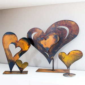Collectible Heart Sculpture – Lovely little patina heart sculpture looks best in a grouping with other mementoes like framed photos of loved ones displayed with other heart sculptures