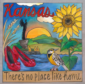 "No Place Like Home" Plaque – A lovely midwest landscape scene featuring the Keeper of the Plains sculpture and ruby slippers