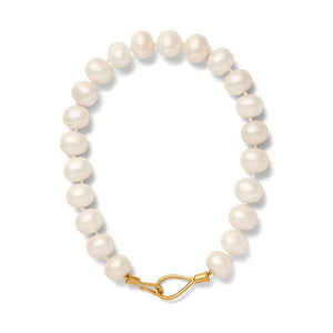 Pebble Pearl Lasso Necklace – Catherine Canino’s best selling traditional statement necklace with luminous white mother of pearl and a signature lasso and hook clasp