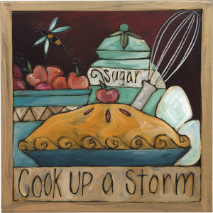 Sticks handmade wall plaque with "Cook up a Storm" quote and dessert themed imagery
