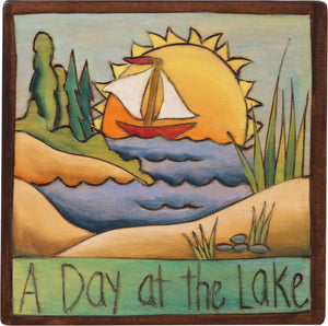7"x7" Plaque –  "A day at the lake" beach landscape with a sailboat in the distance