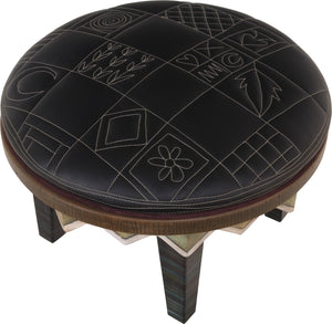 Round Ottoman –  Monochromatic and modern patchwork ottoman design achieved with contrast stitching front view