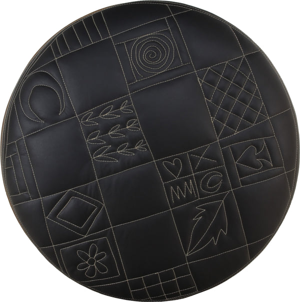 Round Ottoman –  Monochromatic and modern patchwork ottoman design achieved with contrast stitching top view