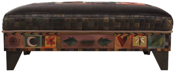 Ottoman with Drawer –  A crazy quilt motif painted in an elegant palette beautifully pops off the black leather top front view