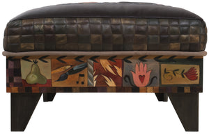 Ottoman with Drawer –  A crazy quilt motif painted in an elegant palette beautifully pops off the black leather top left side view