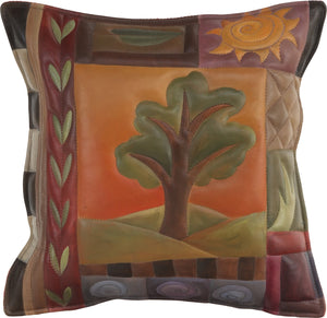Leather Pillow –  Hand painted pillow in warm hues with a tree at the center