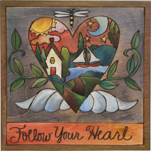 Sticks handmade wall plaque with "Follow your heart" quote and heart with wings and home imagery