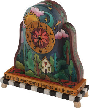 Mantel Clock –  Elegant and colorful clock featuring a heart home and sun and moon motif