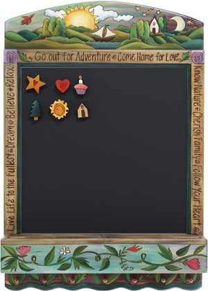 Info Center –  "Go out for Adventure/Come Home for Love" activity board with sunset and sailboat motif