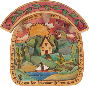 Stool with Back –  "Go Out for Adventure/Come Home for Love" stool with back with sun setting over a cozy cottage nestled in the hills motif