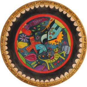 Vibrant folk art icons float in the center with a scallop edge